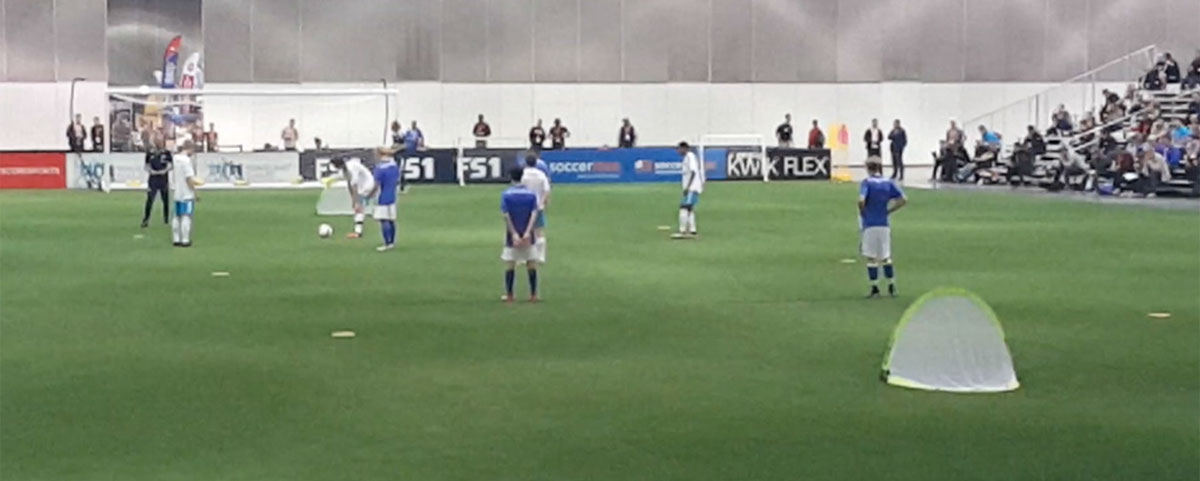 Bodo Menze and Gerald Asamoah presented a session from the Schalke training program